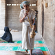 A man smokes a hookah in his home in Nasirai, in Hormozgan province.